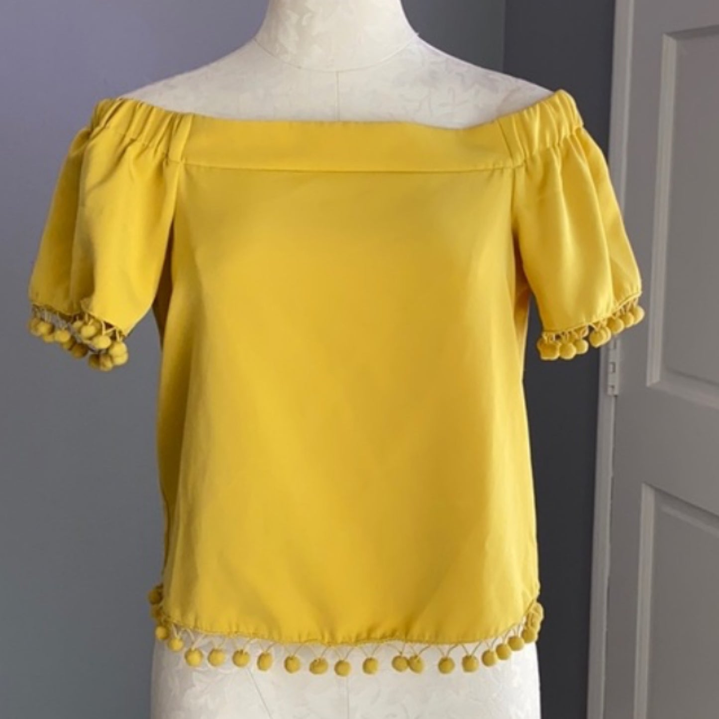 Yellow Off the Shoulder Pom Shirt
