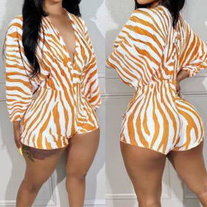 “Lioness” Orange/White Zebra Stripe Pleated Long Sleeve Romper